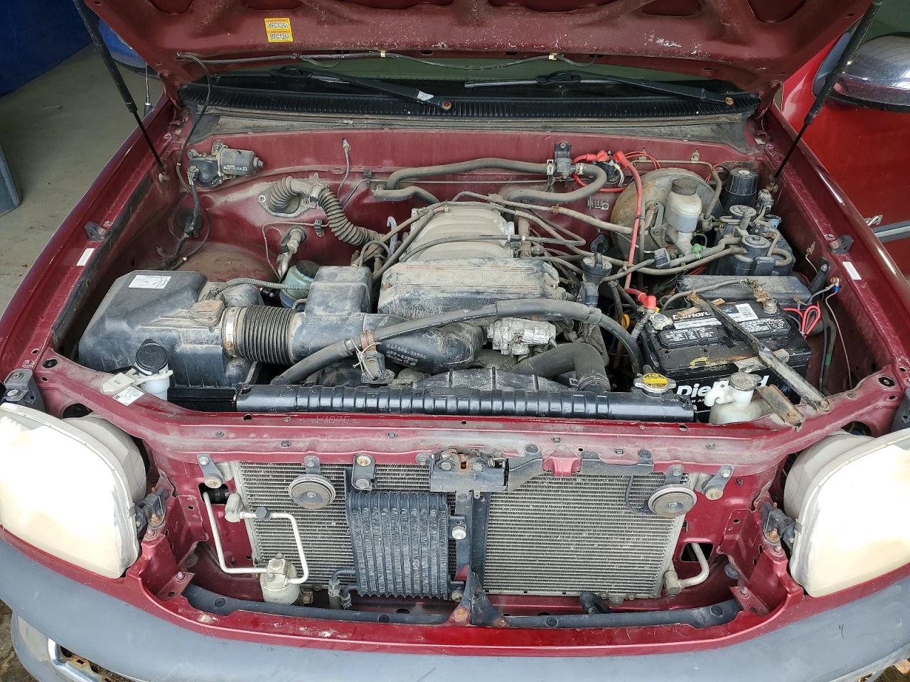 2000 Toyota Tundra Sr5 Red vin: 5TBBT4412YS033044