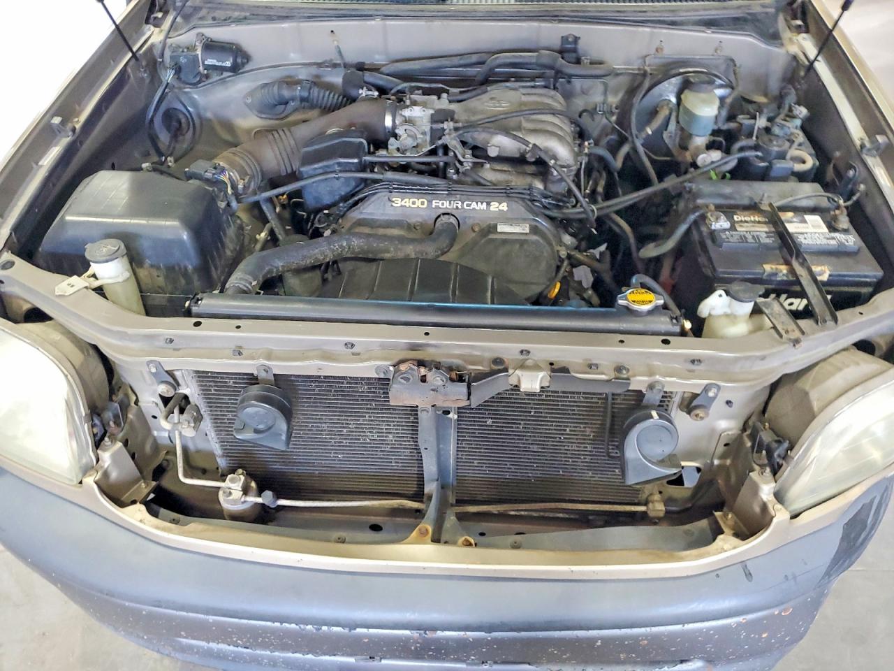 2002 Toyota Tundra Base Желто-коричневый vin: 5TBJN32152S281993