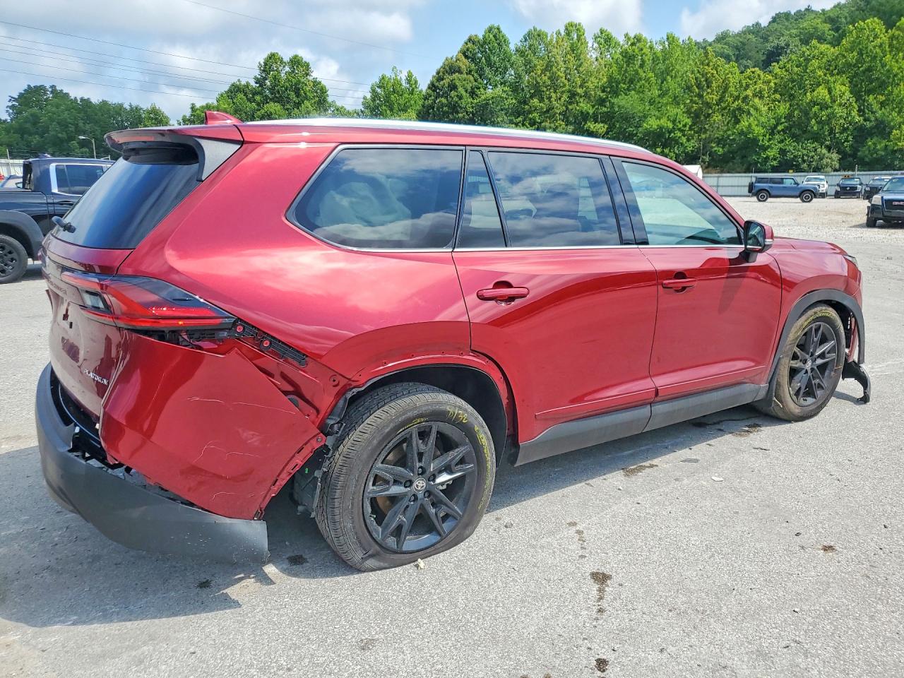2026 Toyota Grand Highlander Platinum Red vin: 5TDAAAB51TS130595