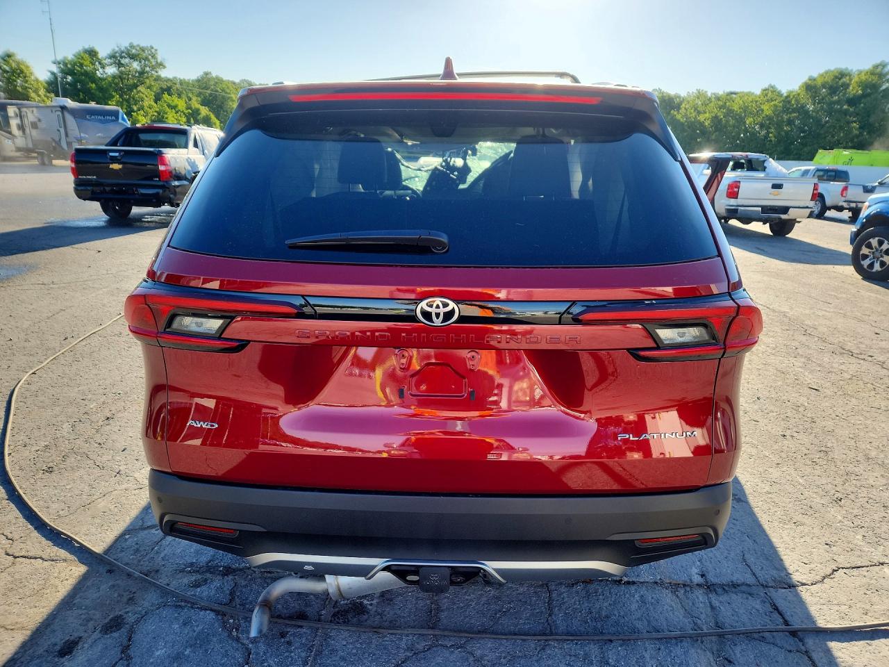 2025 Toyota Grand Highlander Platinum Red vin: 5TDAAAB53SS081446