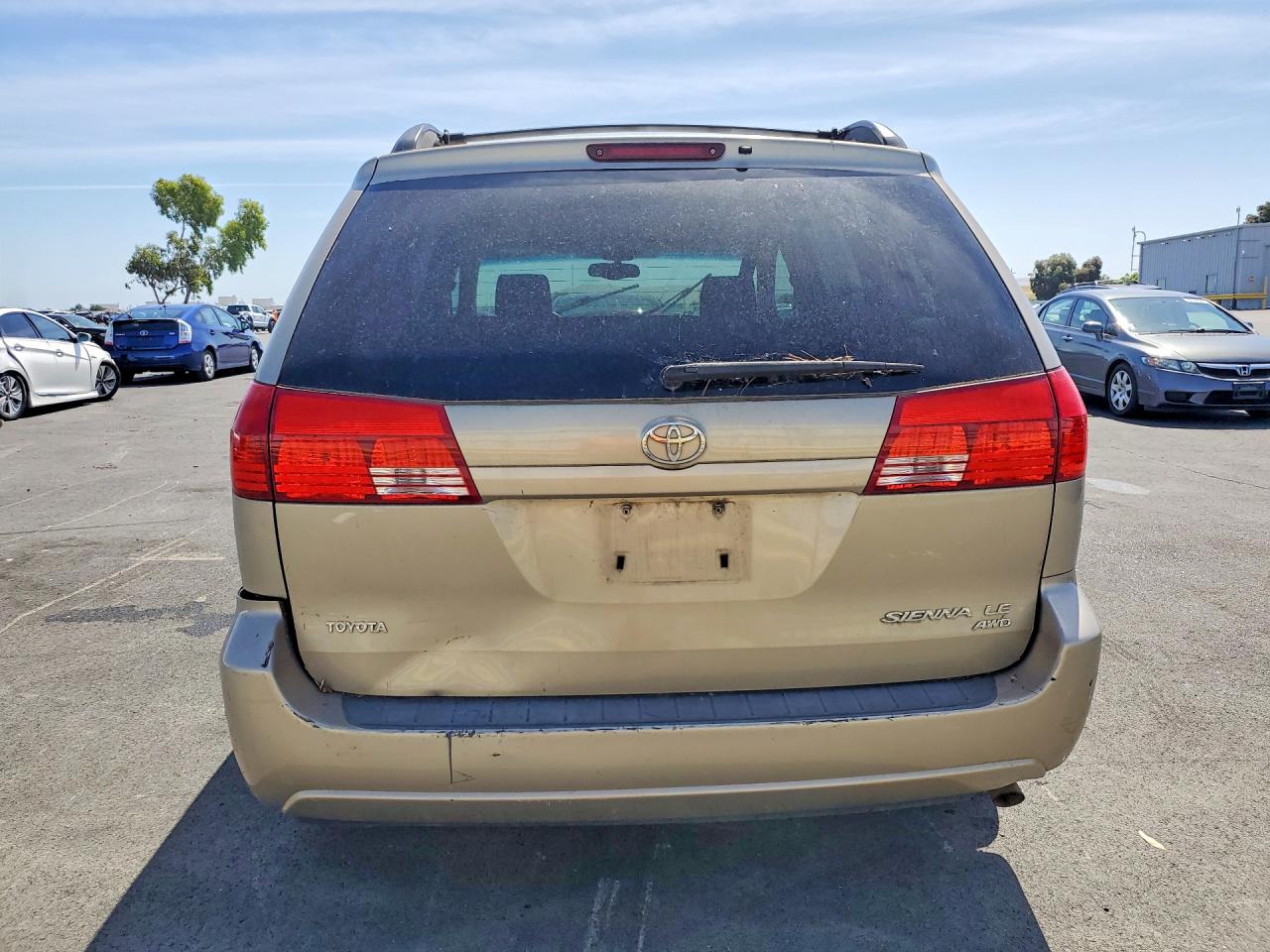 2004 Toyota Sienna Le Tan vin: 5TDBA23C74S003844