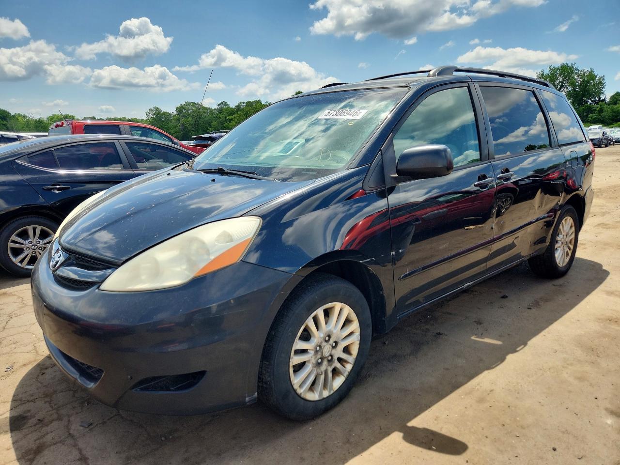 2009 Toyota Sienna Le Black vin: 5TDBK23C39S027529