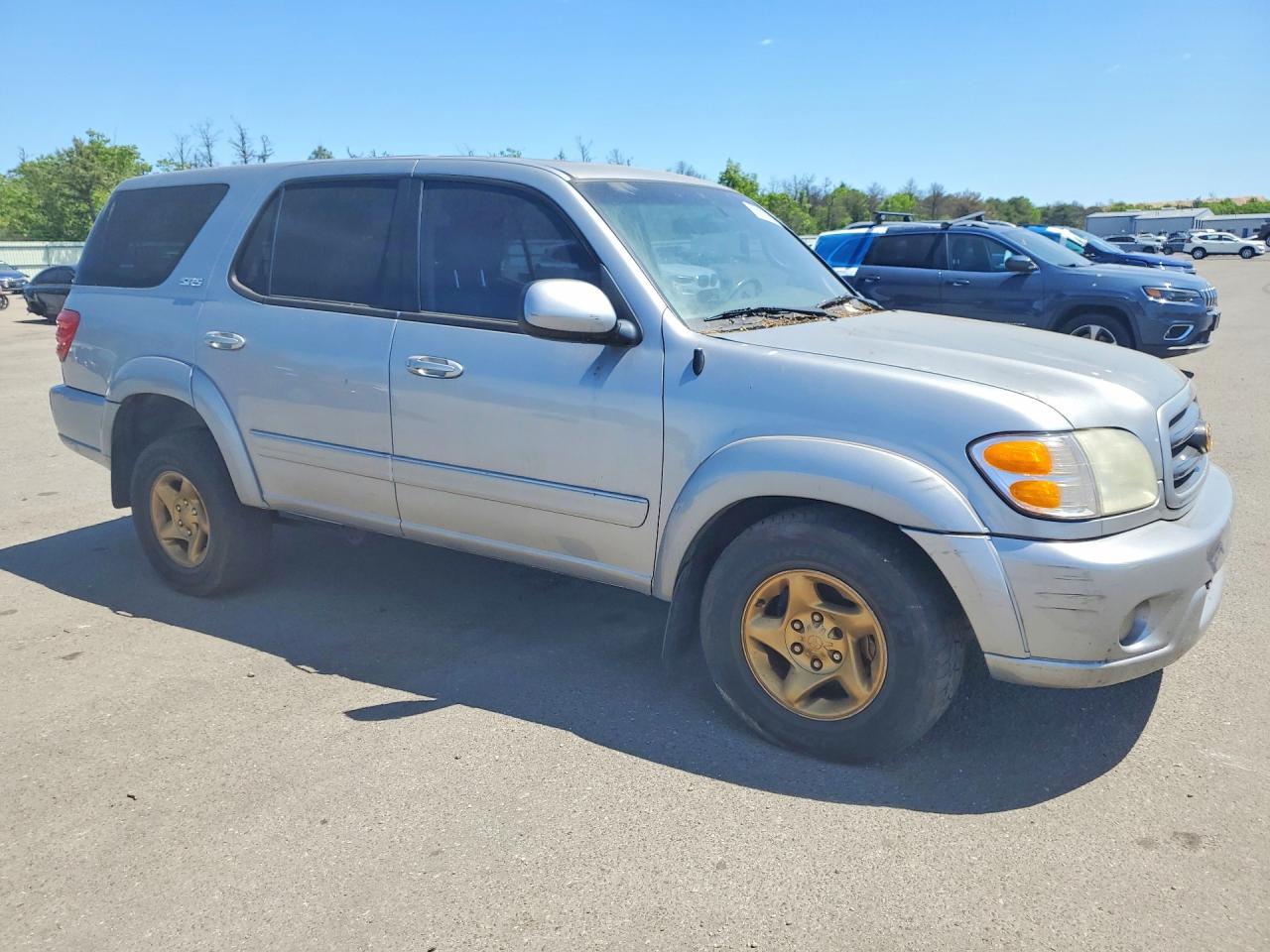 2002 Toyota Sequoia Серебряный vin: 5TDBT44A22S070870