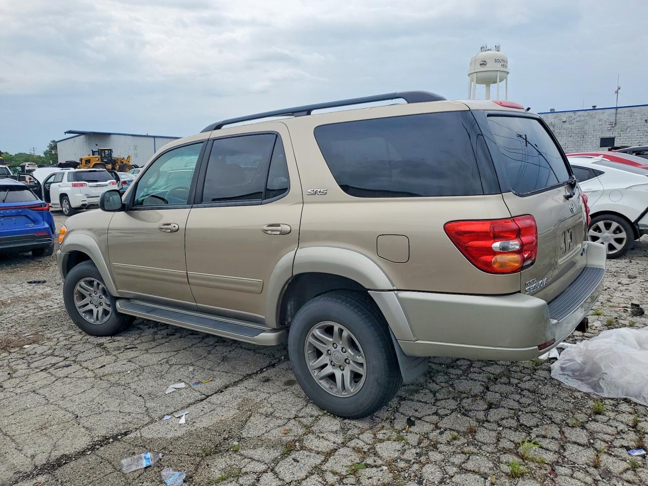 2004 Toyota Sequoia Золотой vin: 5TDBT44A84S205577