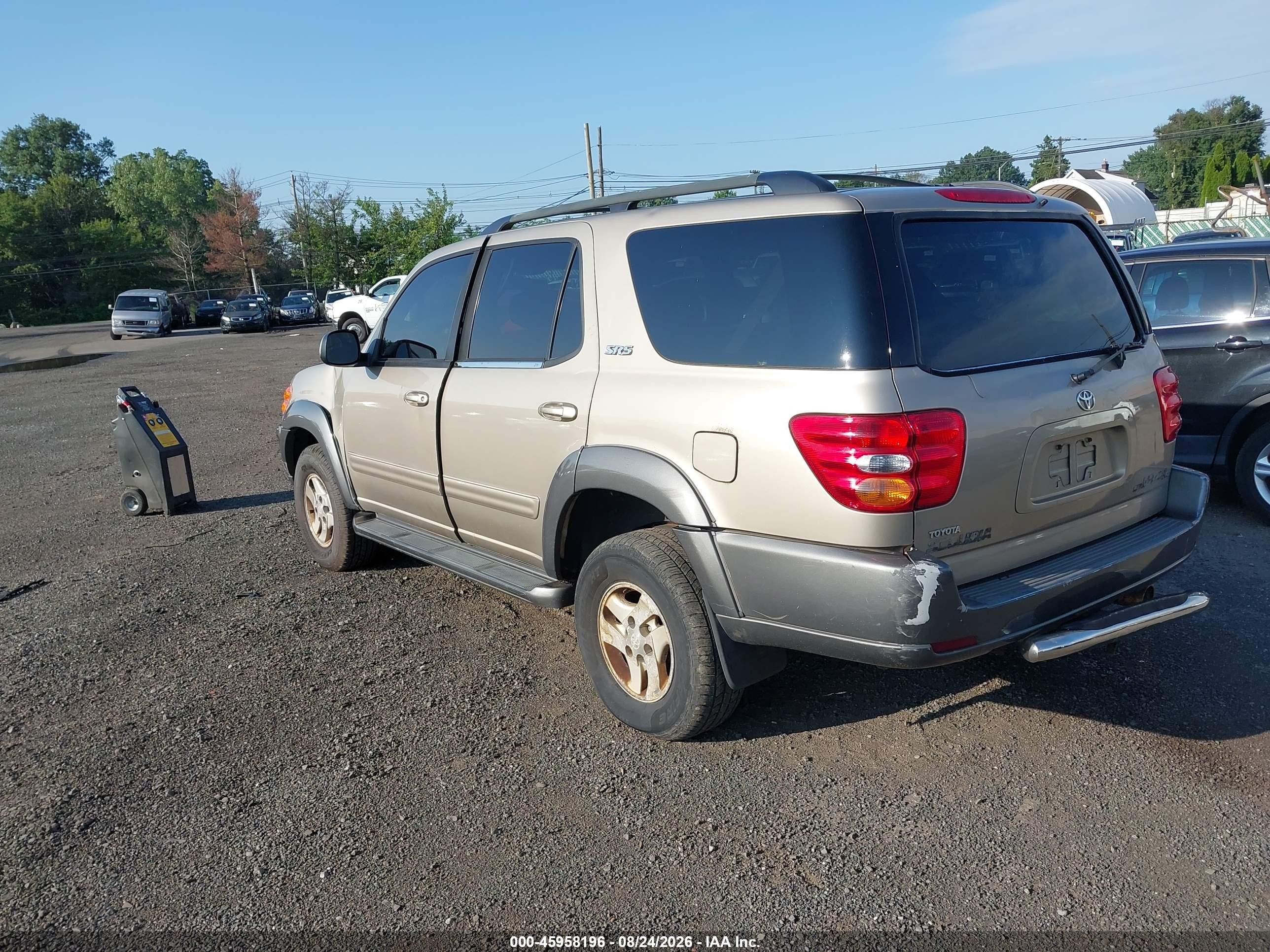 2004 Toyota Sequoia Sr5 V8 Champagne vin: 5TDBT44A94S206916