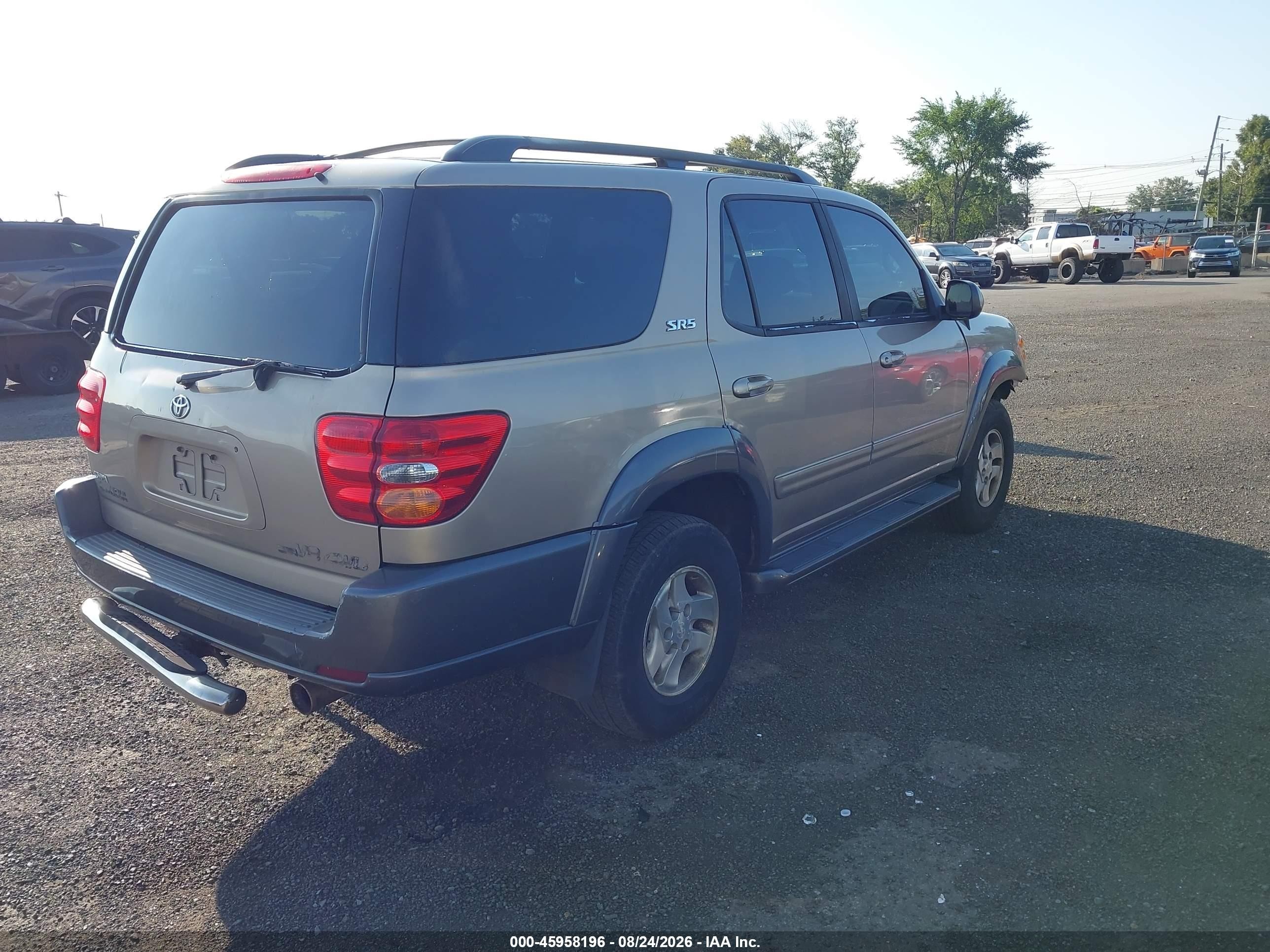 2004 Toyota Sequoia Sr5 V8 Champagne vin: 5TDBT44A94S206916
