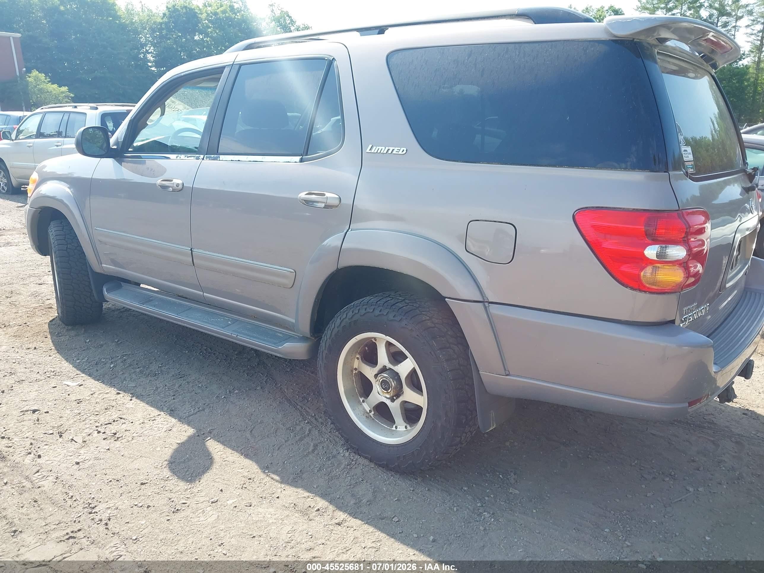 2001 Toyota Sequoia Limited V8 Gold vin: 5TDBT48A21S008006