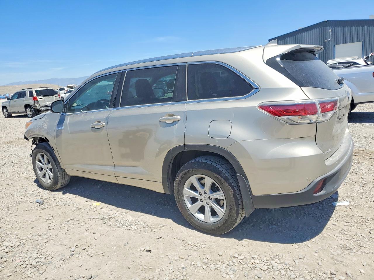 2015 Toyota Highlander Hybrid Limited Platinum Желто-коричневый vin: 5TDDCRFHXFS012284