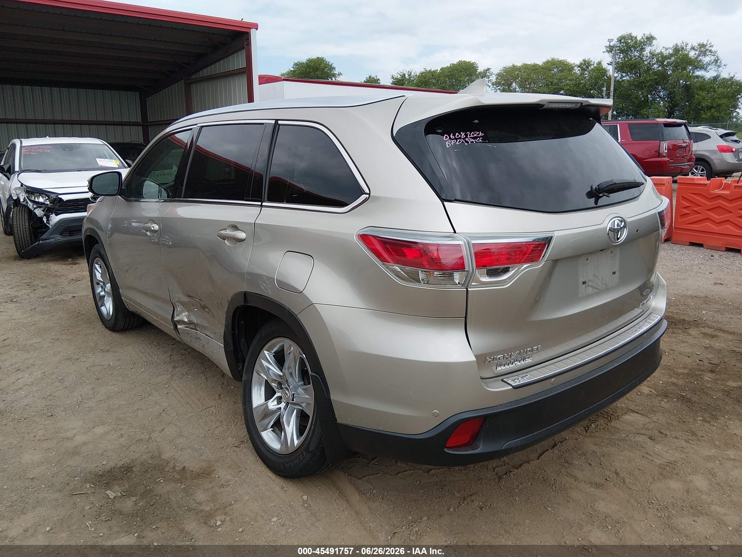 2015 Toyota Highlander Limited Platinum V6 Gold vin: 5TDDKRFH9FS074407