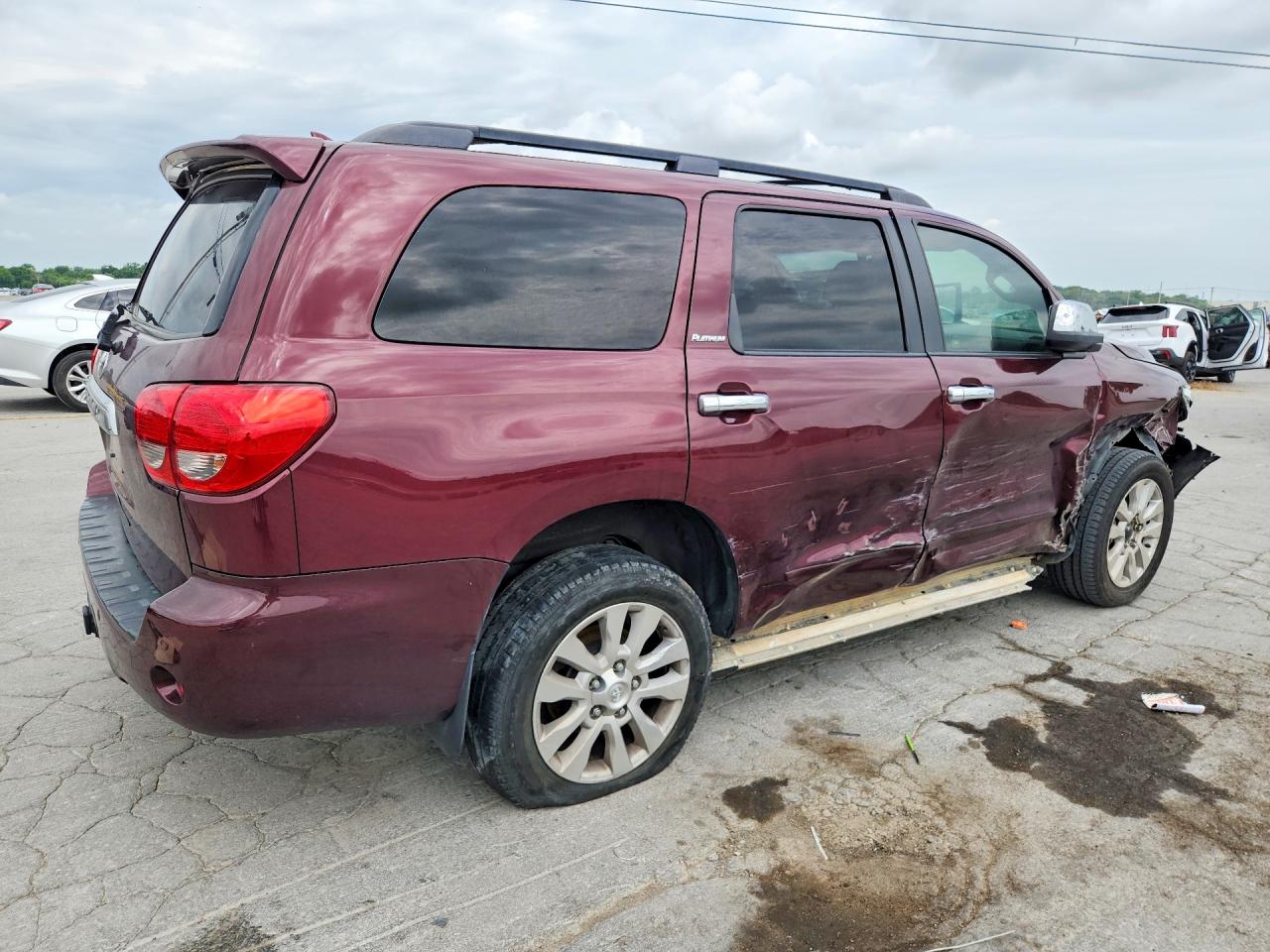 2010 Toyota Sequoia Platinum Burgundy vin: 5TDDW5G10AS029864