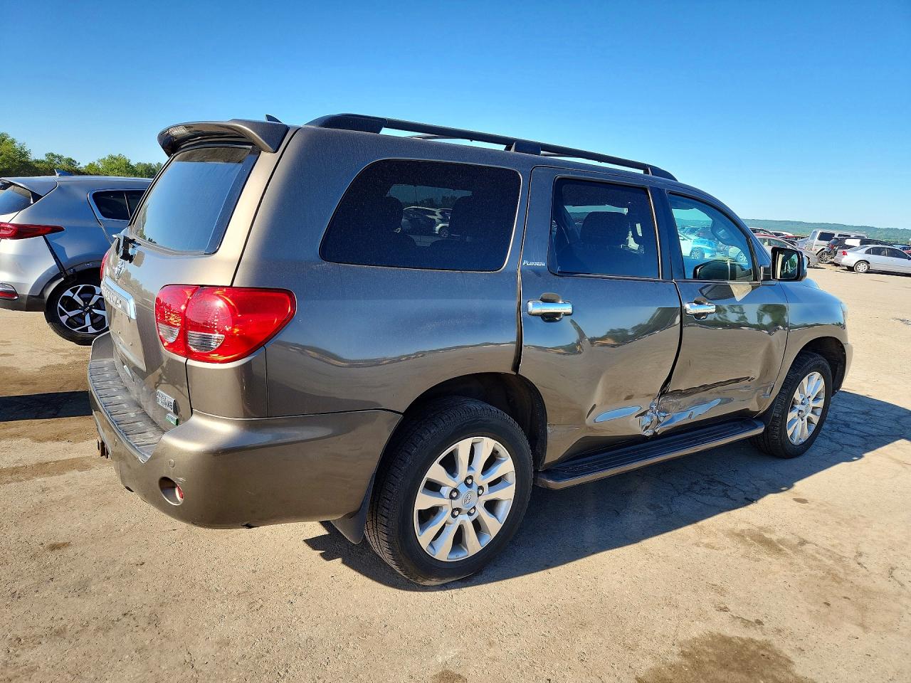 2012 Toyota Sequoia Platinum Tan vin: 5TDDW5G10CS066576