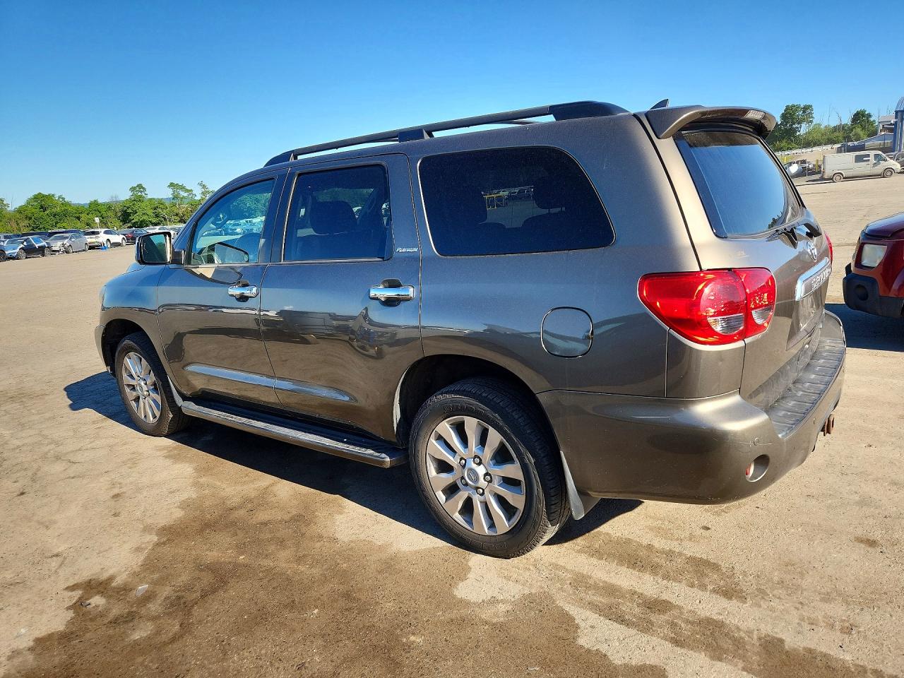 2012 Toyota Sequoia Platinum Tan vin: 5TDDW5G10CS066576