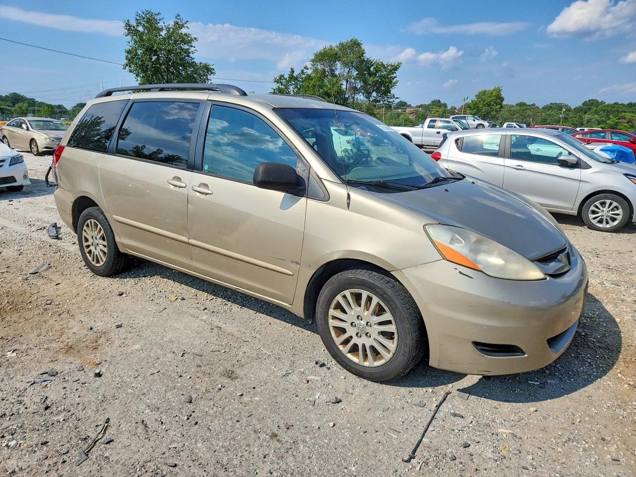 2010 Toyota Sienna Le Tan vin: 5TDJK4CC4AS033920