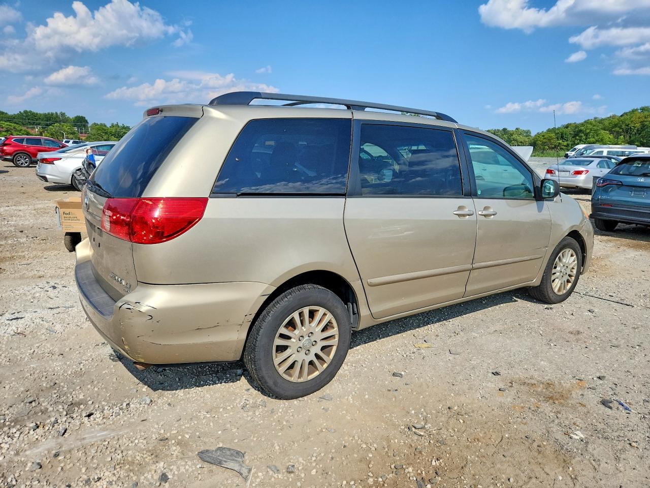 2010 Toyota Sienna Le Tan vin: 5TDJK4CC4AS033920
