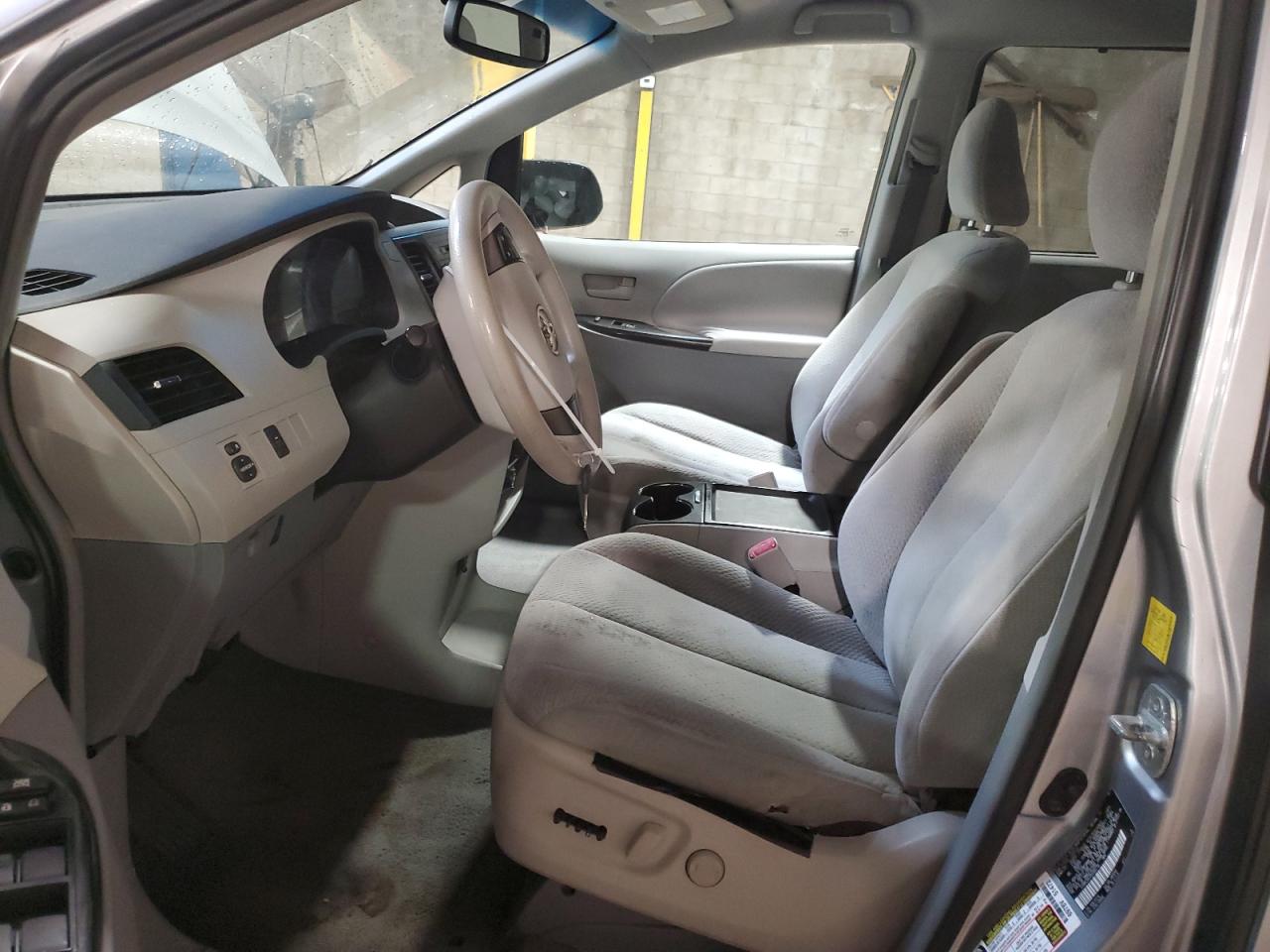 2011 Toyota Sienna Le Silver vin: 5TDKK3DC2BS085710 Damage: Left Front Seat Cushion, Cut, 2 To 3 Inches