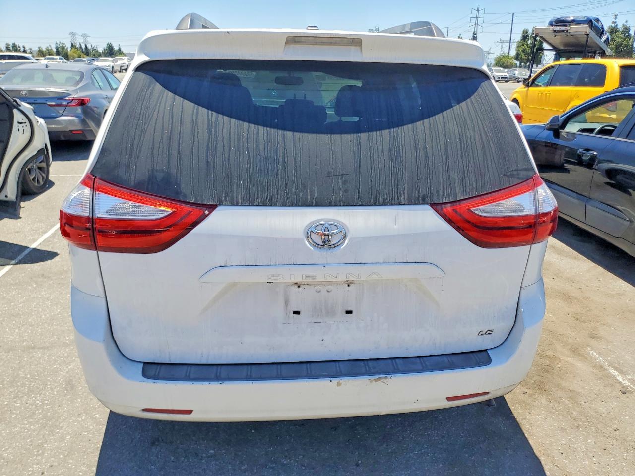 2015 Toyota Sienna Le Белый vin: 5TDKK3DC3FS630402
