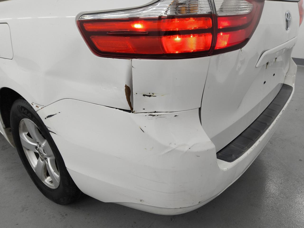 2015 Toyota Sienna Le White vin: 5TDKK3DC8FS614356 Damage: Rear Bumper, Broken, Replacement Required
