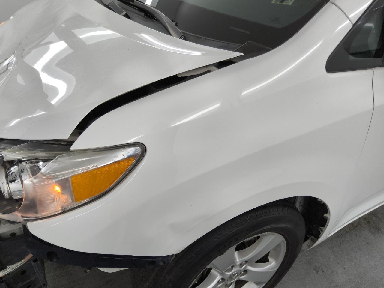 2015 Toyota Sienna Le White vin: 5TDKK3DC8FS614356 Damage: Left Front Fender, Severe Damage, Replacement Required