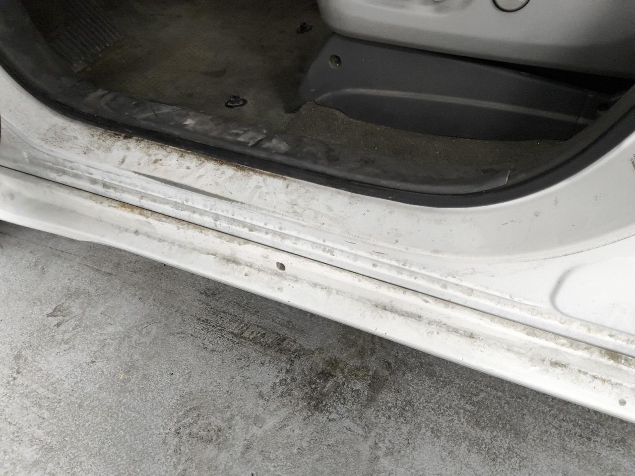 2015 Toyota Sienna Le White vin: 5TDKK3DC8FS614356 Damage: Left Rocker Panel, Heavy Scratch, 1/2 To 1 Inch