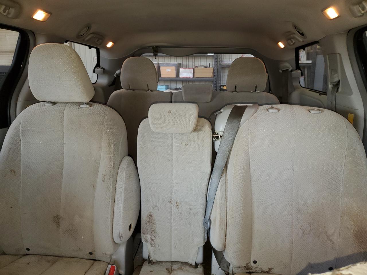 2014 Toyota Sienna Le Black vin: 5TDKK3DC9ES476356 Damage: Left Rear Seat Back, Stained, Permanent
