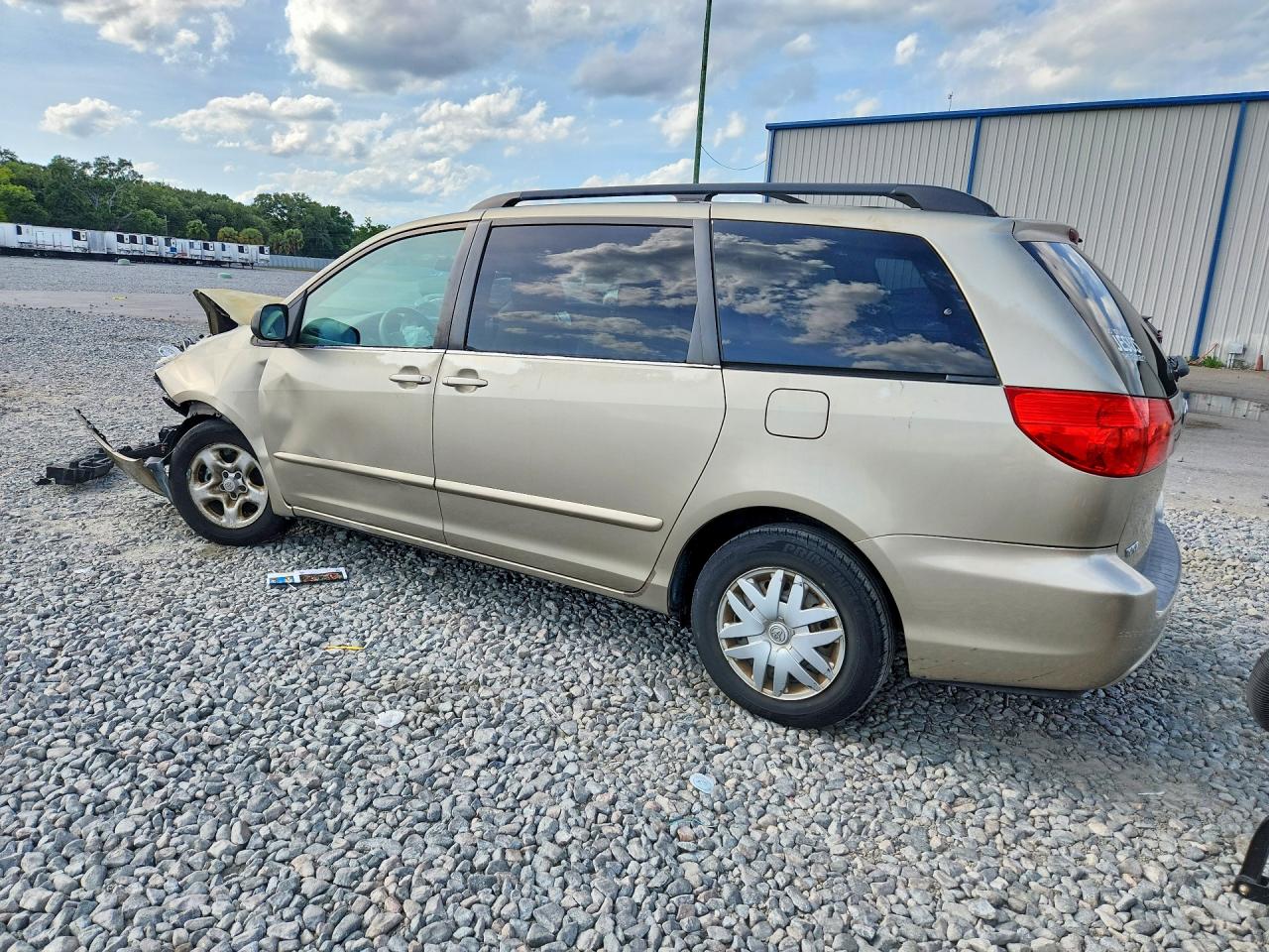 2010 Toyota Sienna Le 7-passenger Tan vin: 5TDKK4CC0AS289086