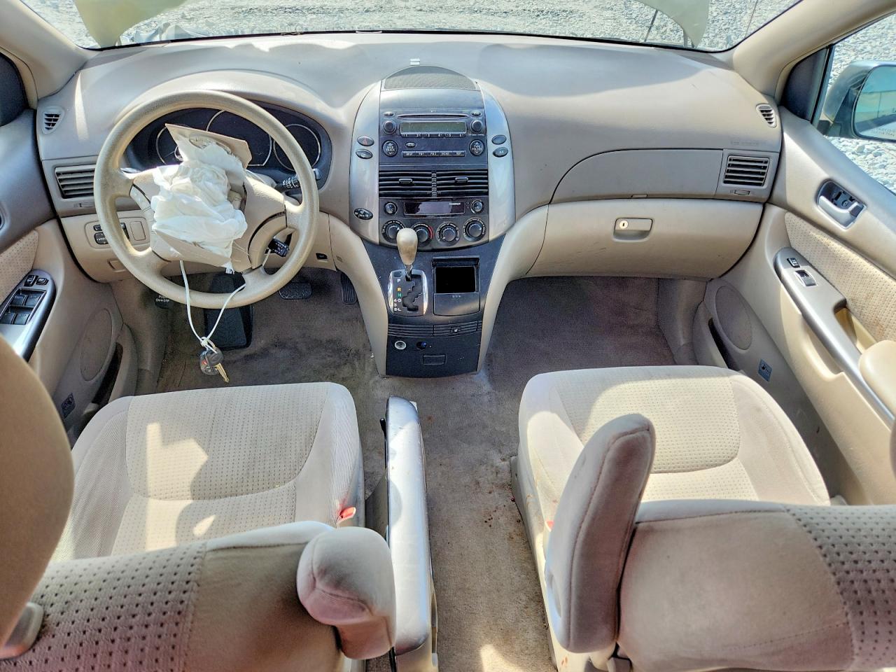 2010 Toyota Sienna Le 7-passenger Tan vin: 5TDKK4CC0AS289086