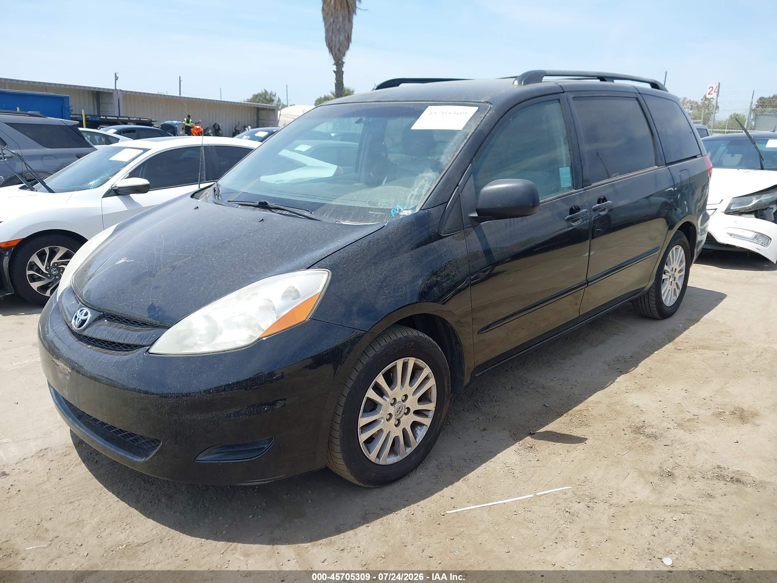 2010 Toyota Sienna Le Black vin: 5TDKK4CC4AS318203