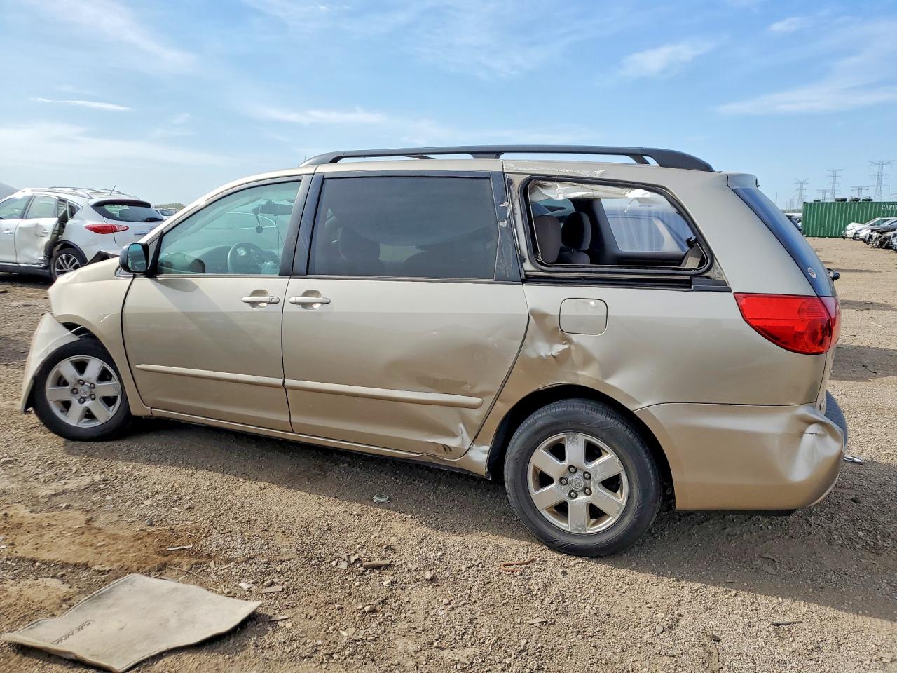 2010 Toyota Sienna Le 8-passenger Beige vin: 5TDKK4CC7AS326294