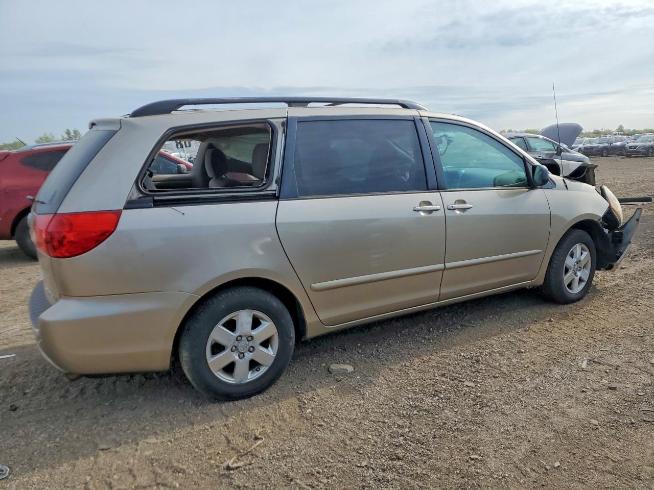 2010 Toyota Sienna Le 8-passenger Beige vin: 5TDKK4CC7AS326294