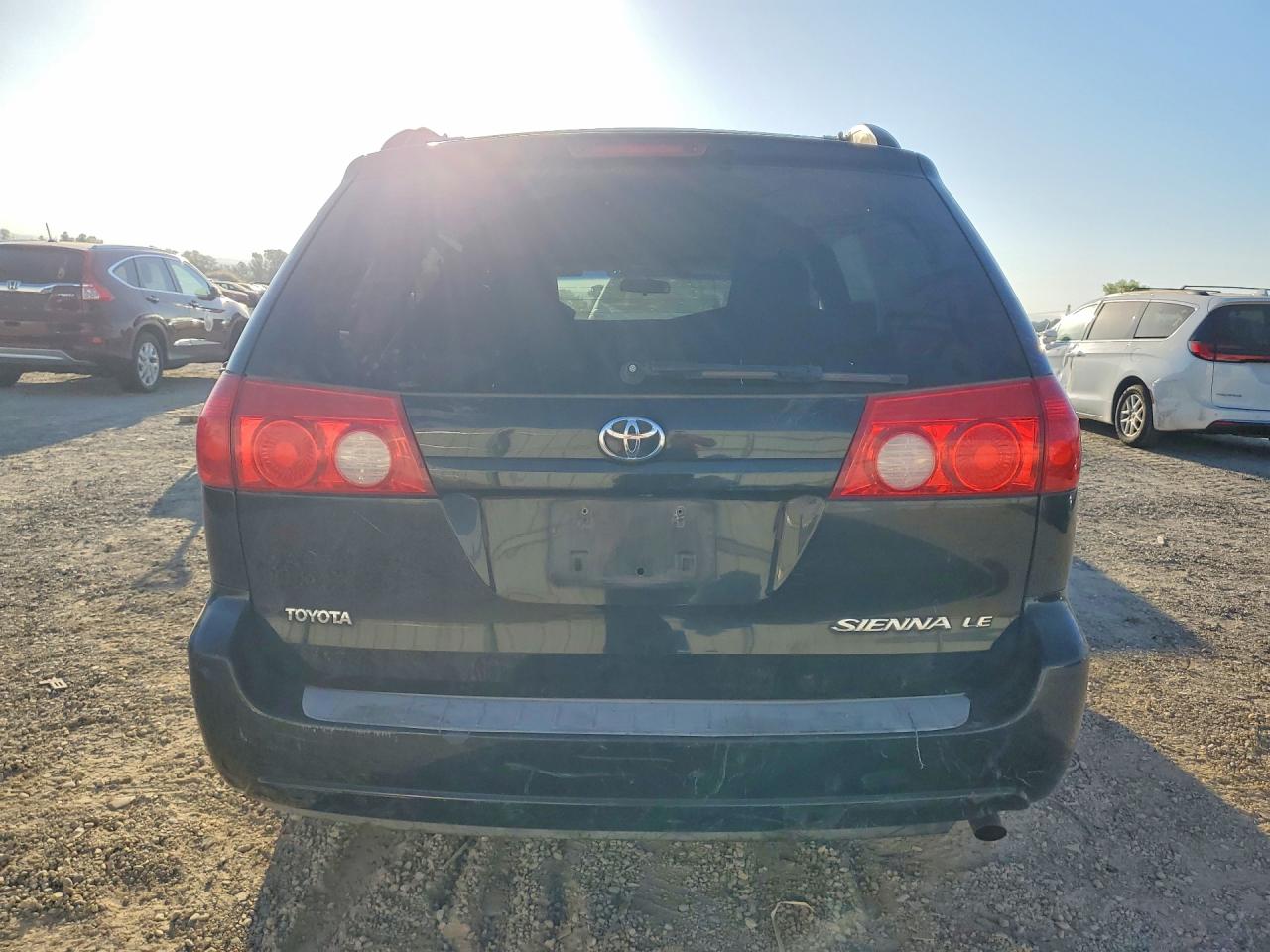 2010 Toyota Sienna Le 7-passenger Black vin: 5TDKK4CC8AS289725