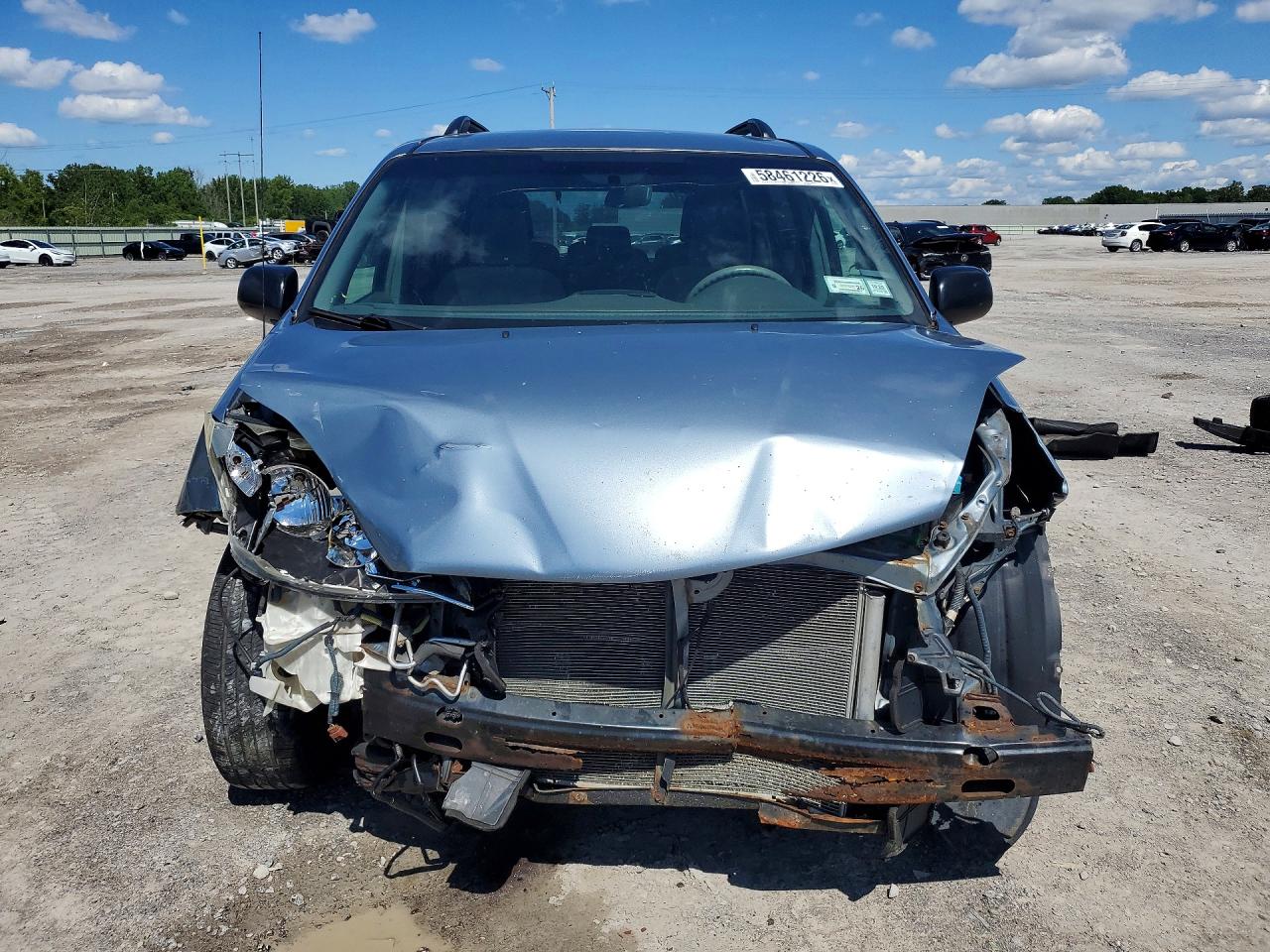2010 Toyota Sienna Le 8-passenger Blue vin: 5TDKK4CC9AS305429