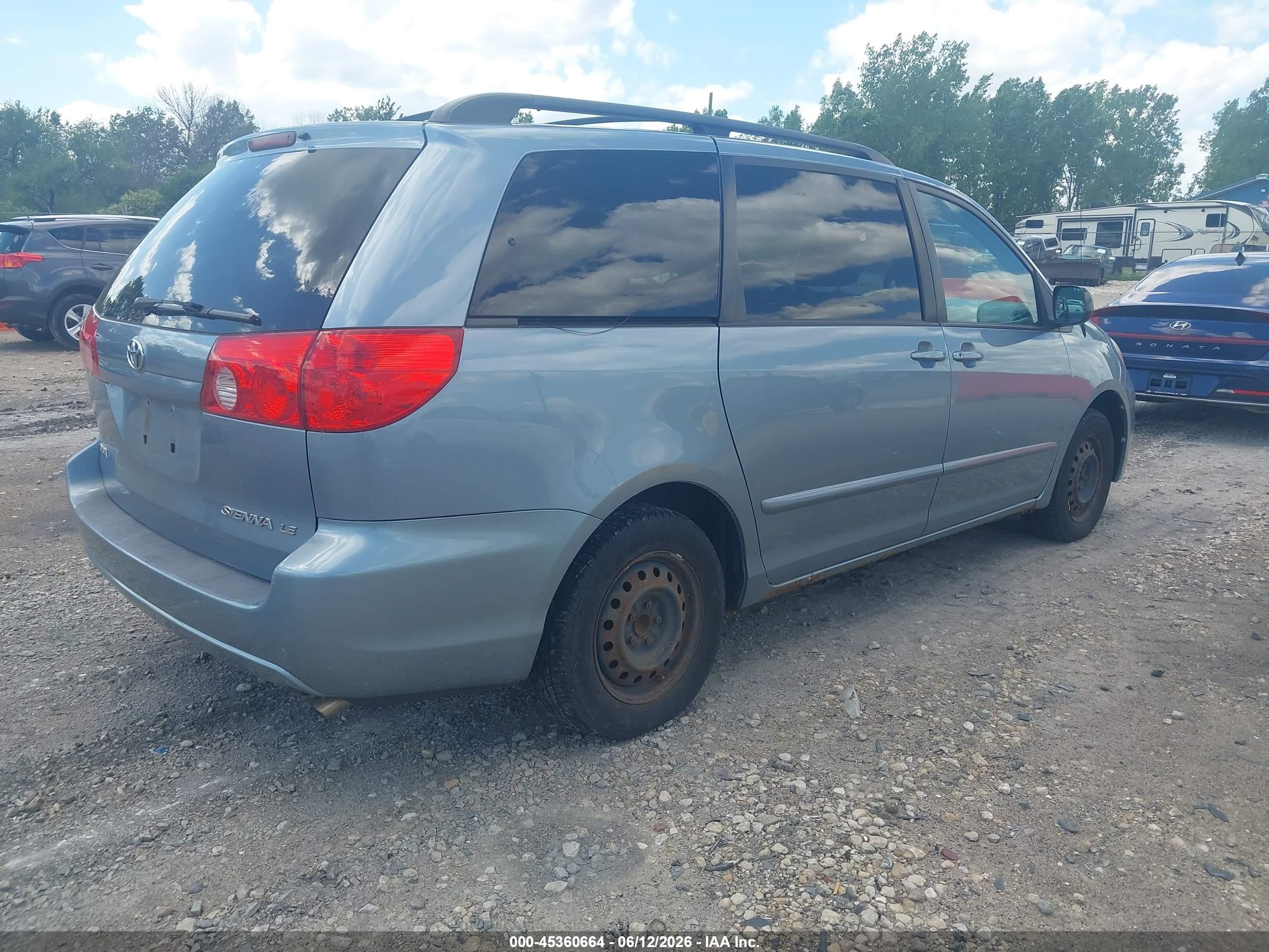 2010 Toyota Sienna Le Light Blue vin: 5TDKK4CCXAS325785