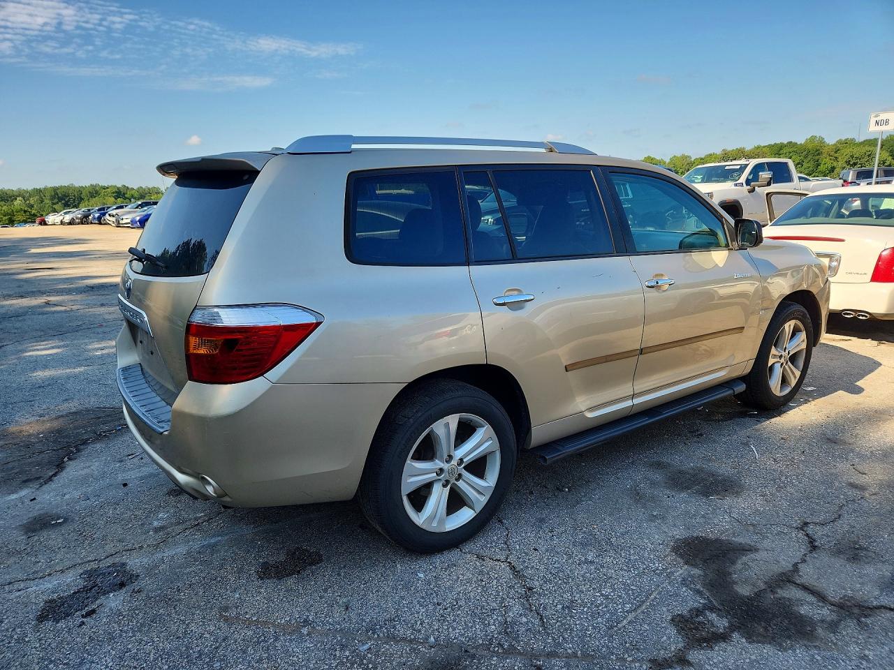 2010 Toyota Highlander Limited Золотой vin: 5TDYK3EHXAS007985
