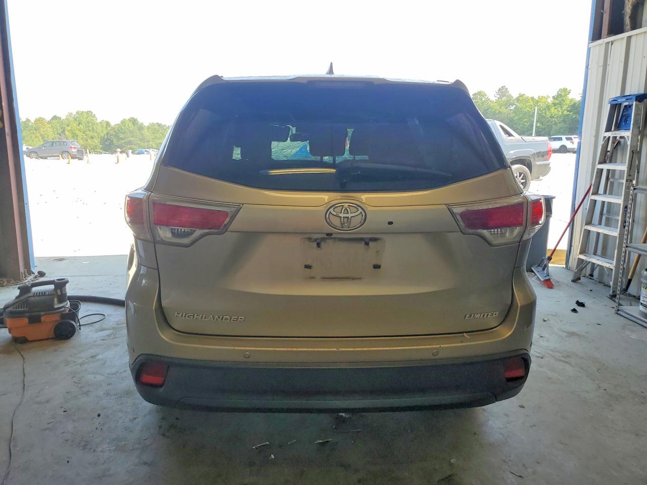 2014 Toyota Highlander Limited Золотой vin: 5TDYKRFH4ES013918