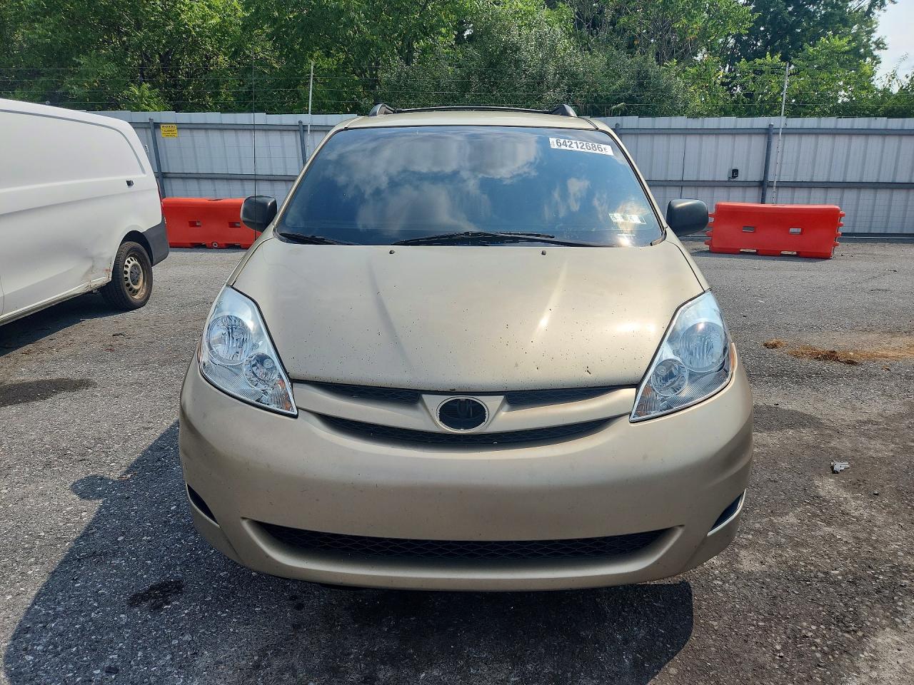 2006 Toyota Sienna Le 7 Passenger Золотой vin: 5TDZA23C46S520441