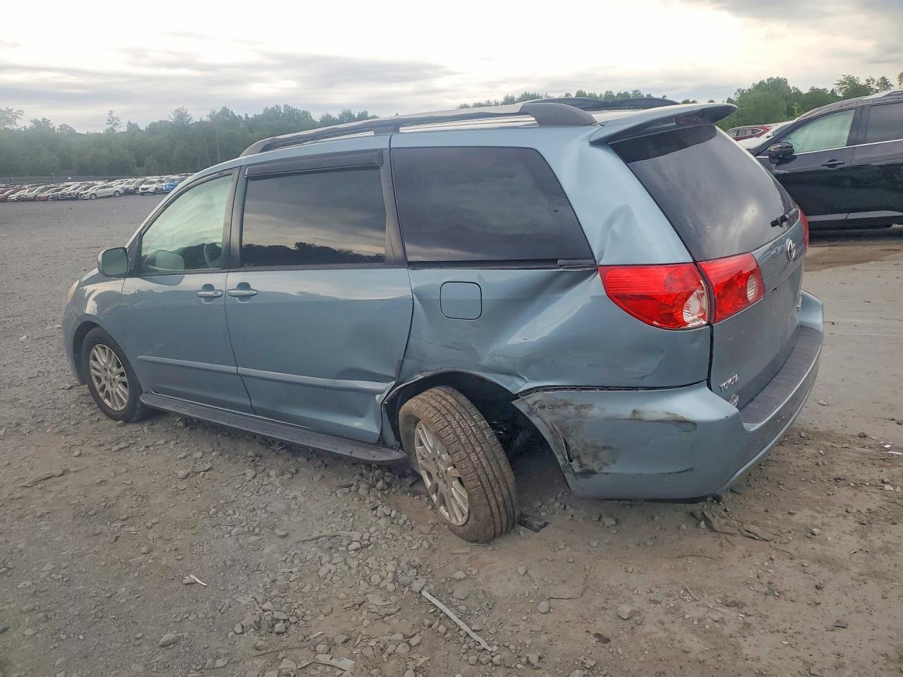 2009 Toyota Sienna Синий vin: 5TDZK22CX9S237402