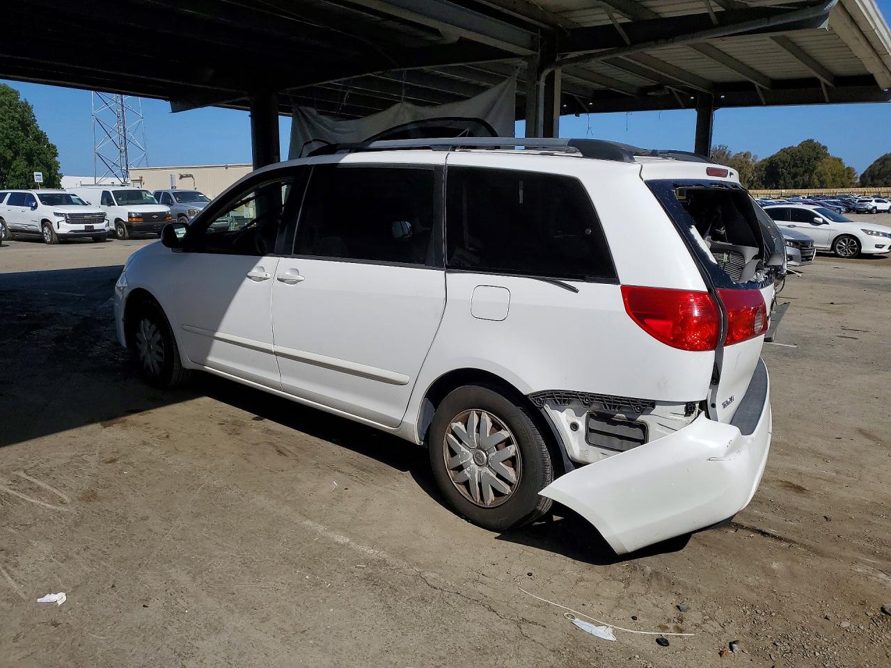 2009 Toyota Sienna Le 8-passenger White vin: 5TDZK23C09S237035