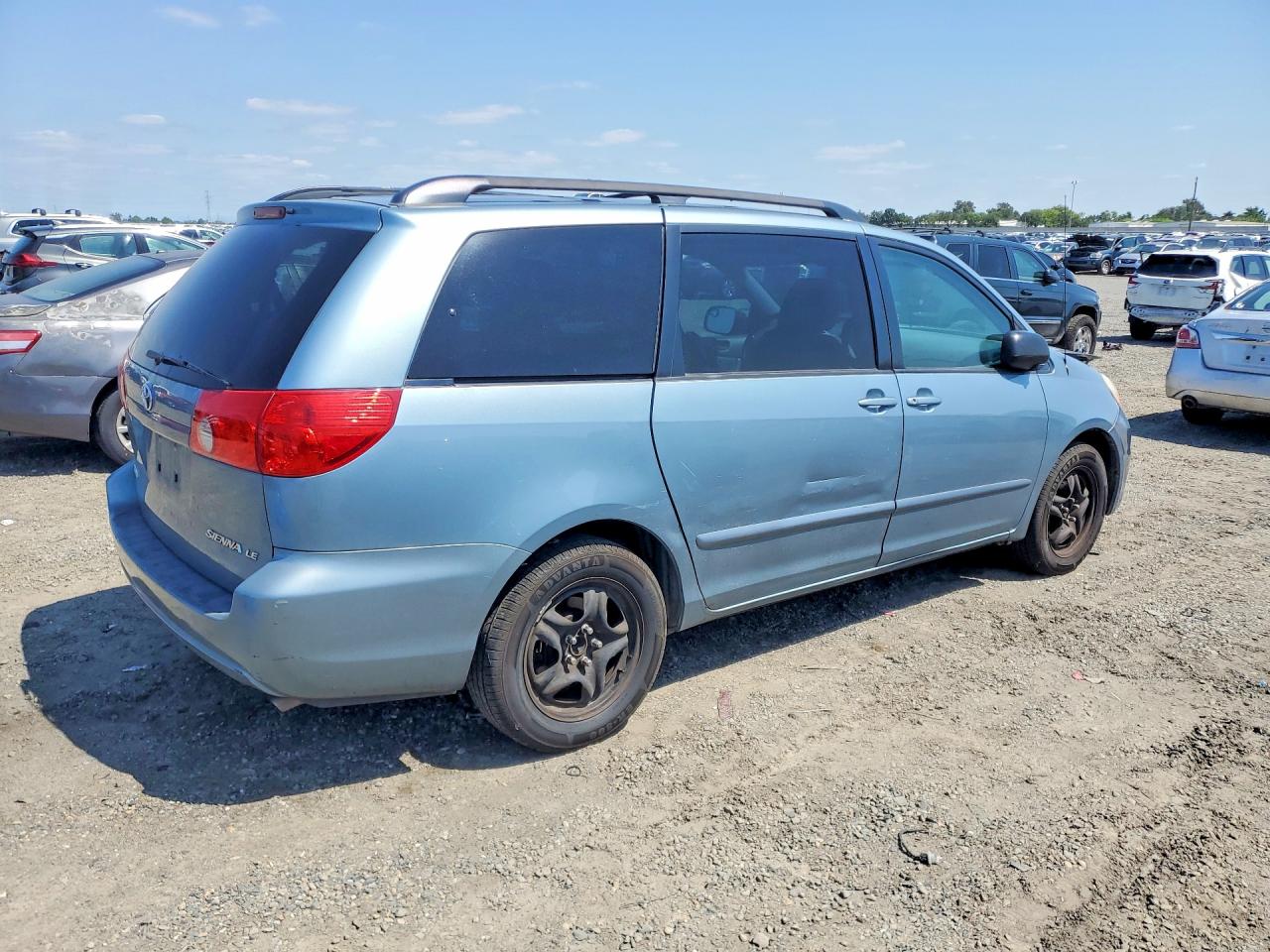 2009 Toyota Sienna Le 7-passenger Blue vin: 5TDZK23C09S252814