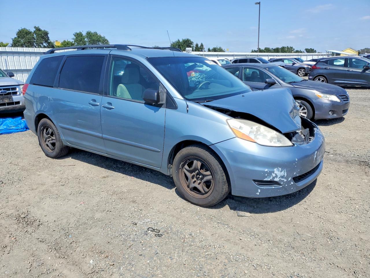 2009 Toyota Sienna Le 7-passenger Blue vin: 5TDZK23C09S252814