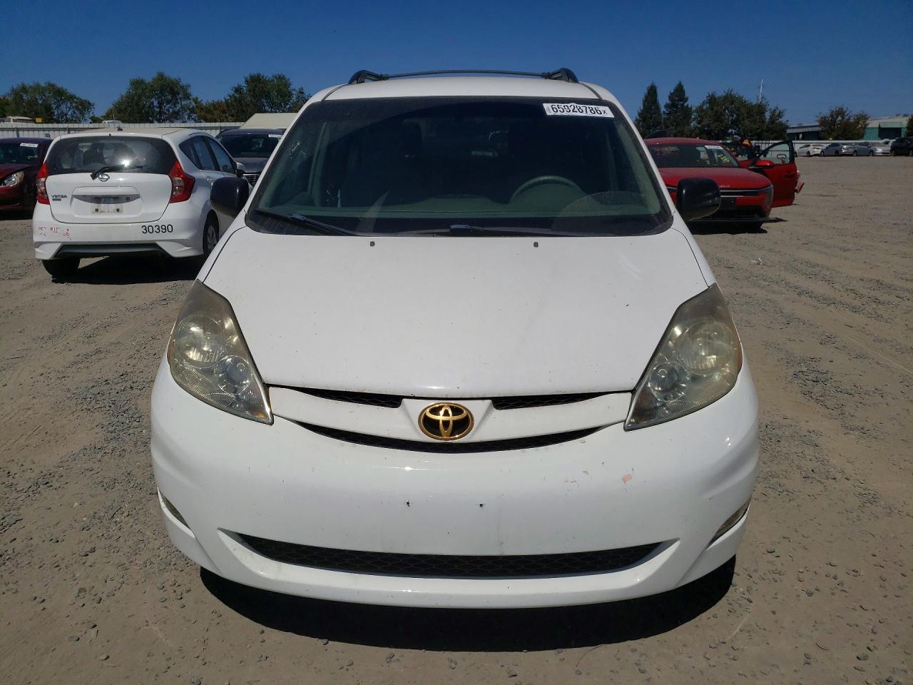 2007 Toyota Sienna Le 7-passenger White vin: 5TDZK23C17S011390