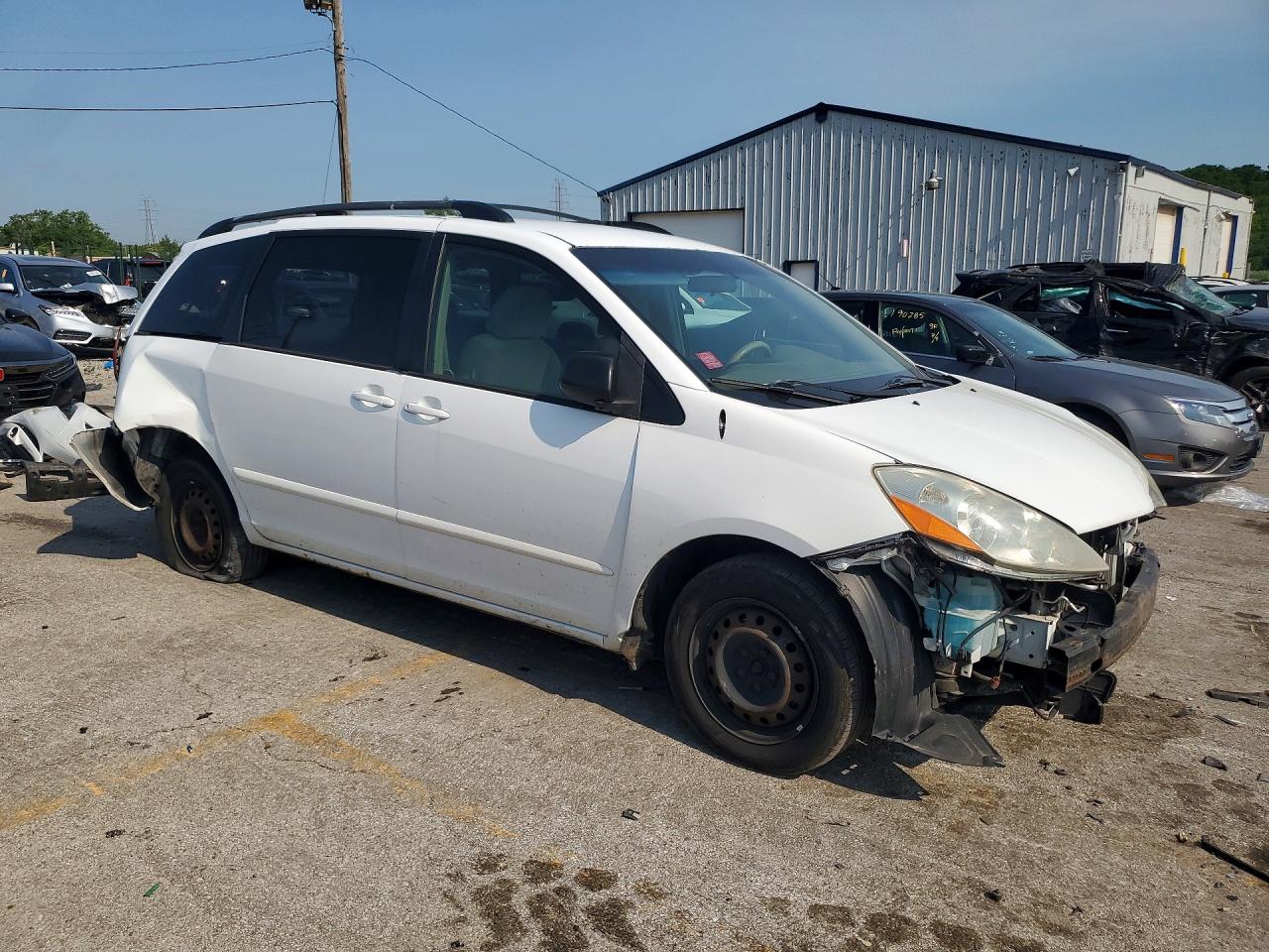 2009 Toyota Sienna Le 8-passenger White vin: 5TDZK23C19S284039