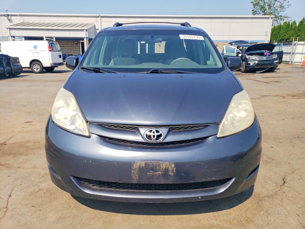 2009 Toyota Sienna Le 7-passenger Blue vin: 5TDZK23C39S235358