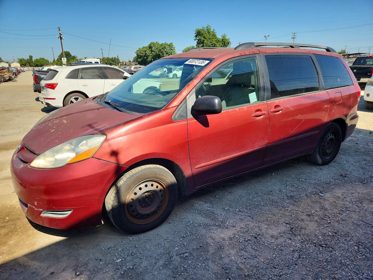 2009 Toyota Sienna Le 8-passenger Red vin: 5TDZK23C49S249608