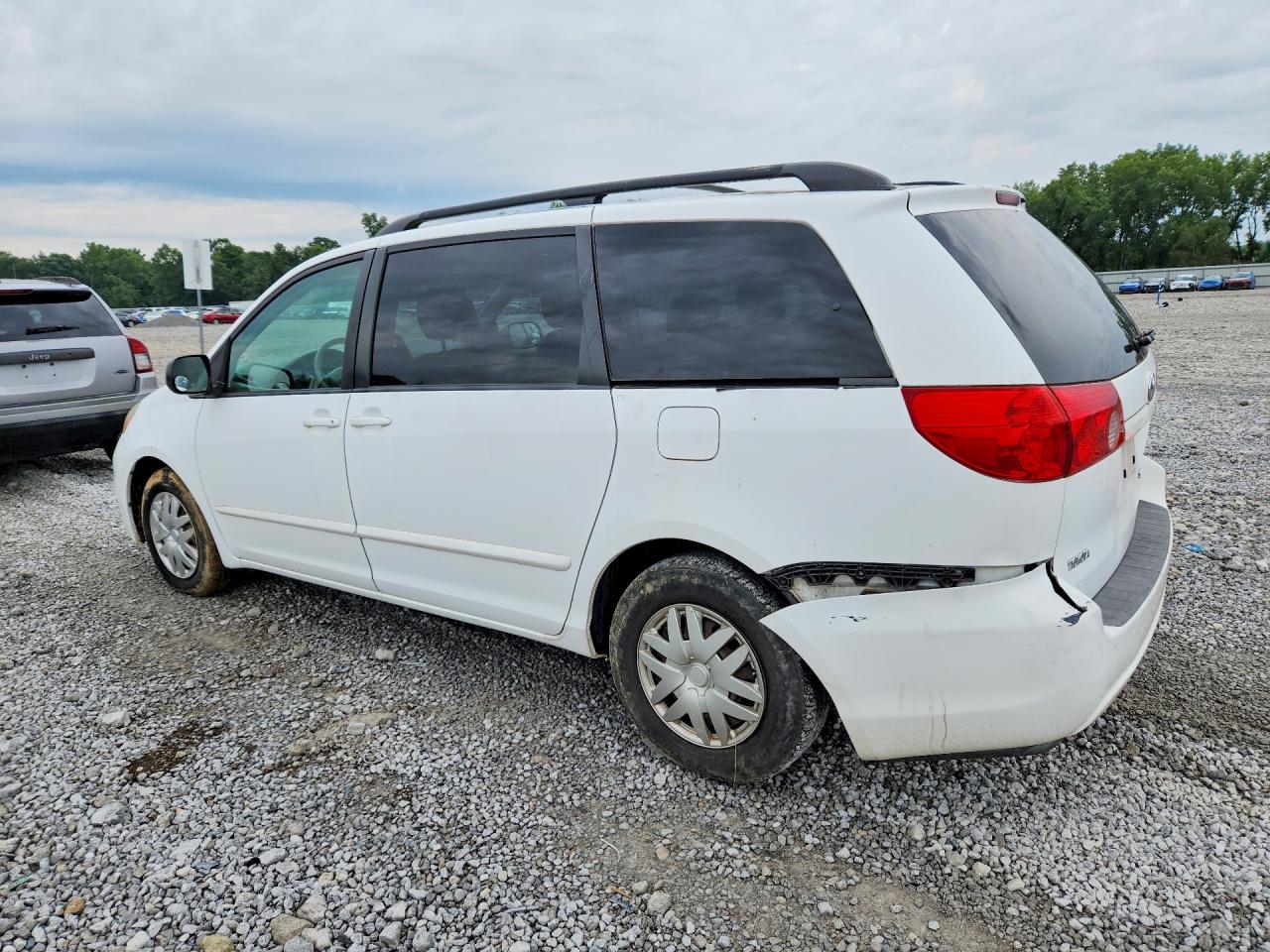 2009 Toyota Sienna Le 8-passenger White vin: 5TDZK23C49S265534