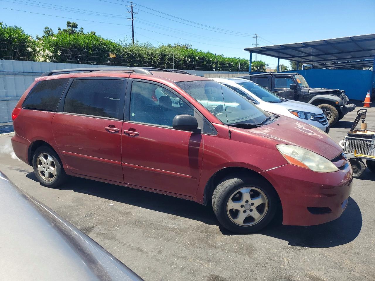 2009 Toyota Sienna Le 8-passenger Темно-бордовый vin: 5TDZK23C49S283774