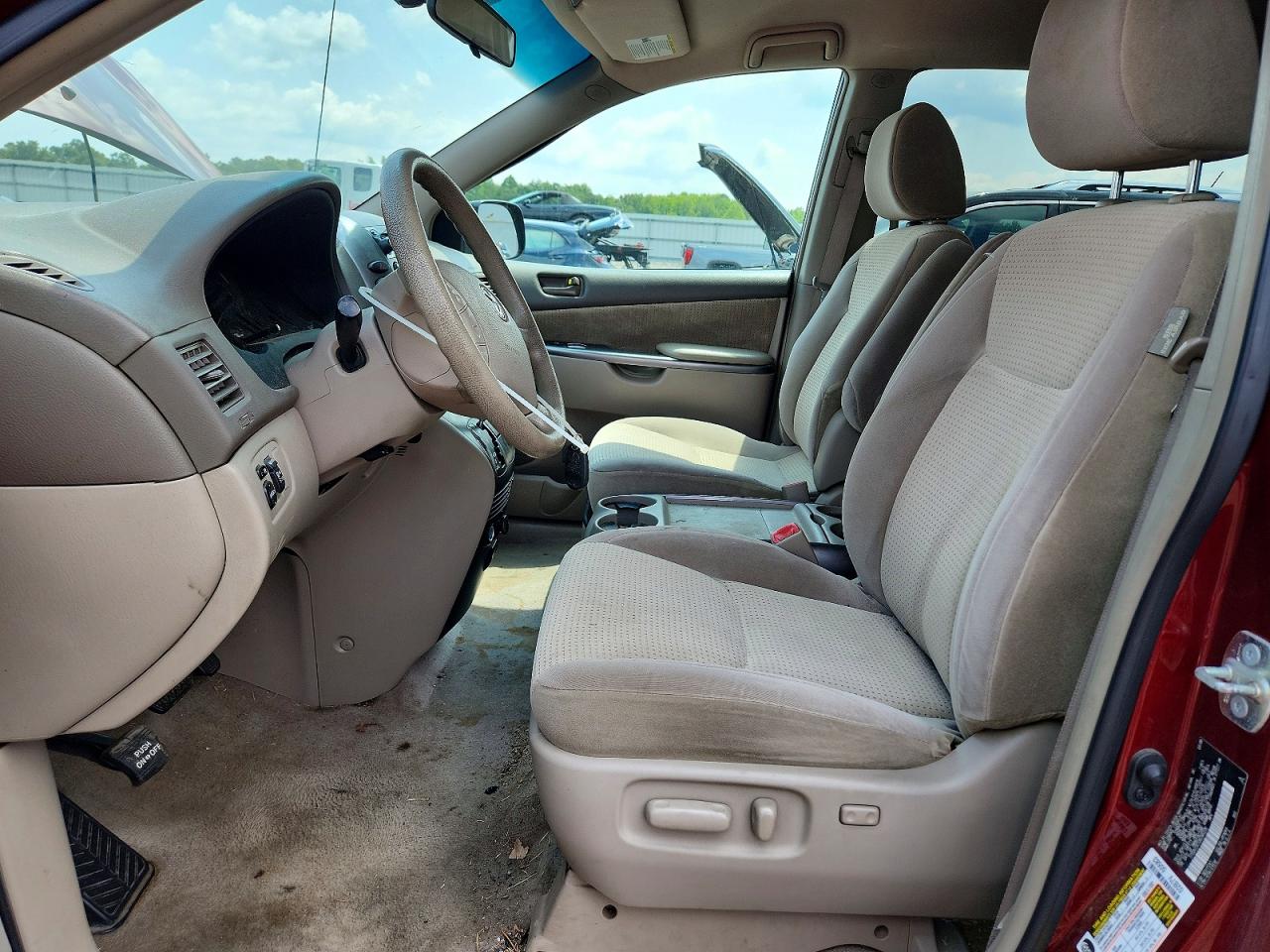 2009 Toyota Sienna Le 7-passenger Maroon vin: 5TDZK23C59S285226