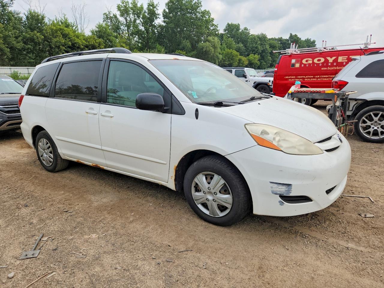 2009 Toyota Sienna Le 8-passenger White vin: 5TDZK23C69S251313