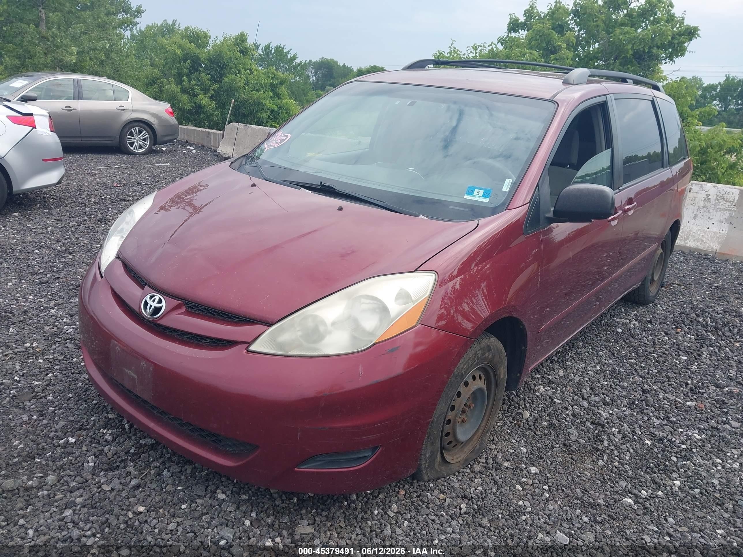 2009 Toyota Sienna Le Красный vin: 5TDZK23C69S254616