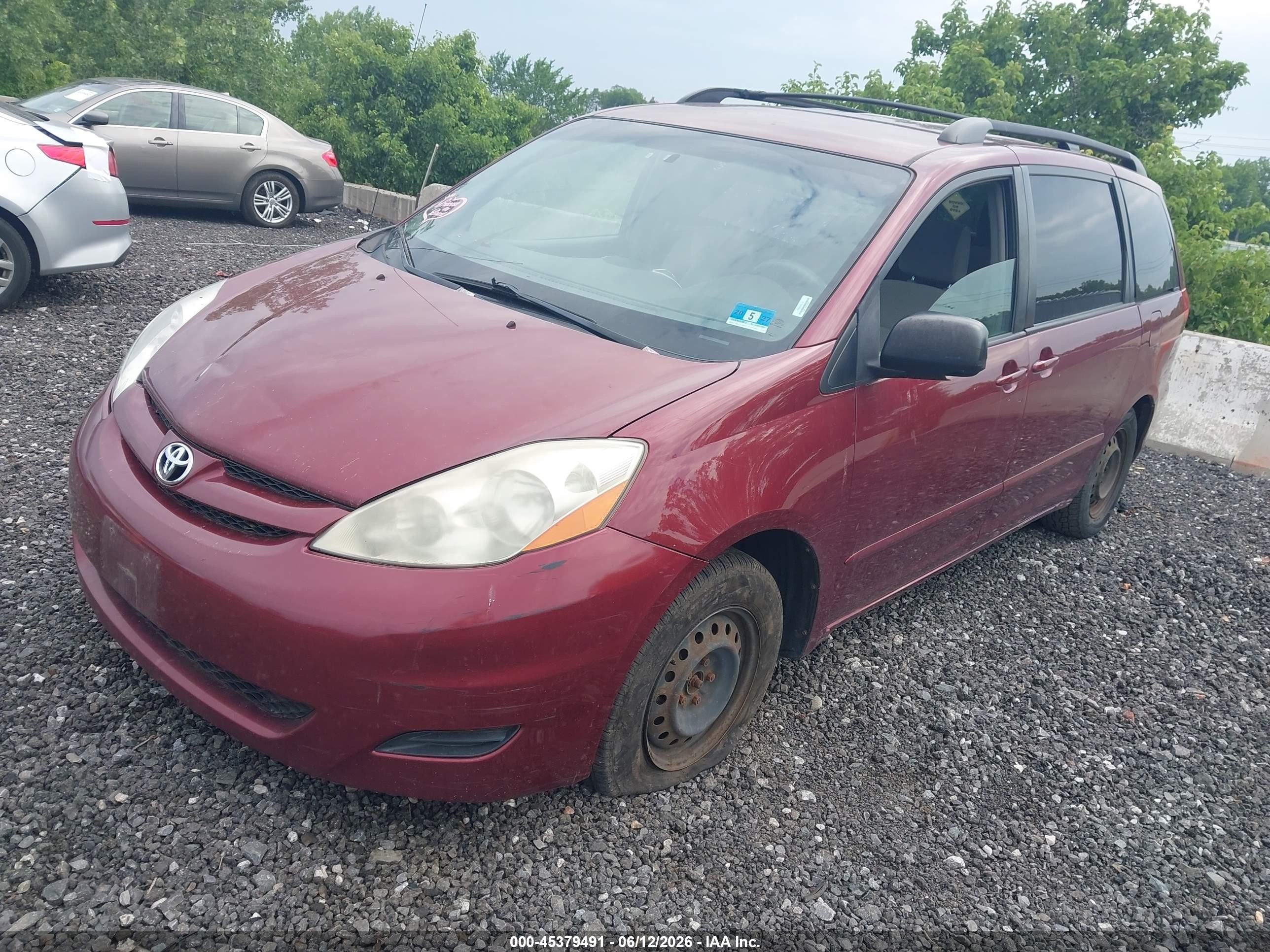 2009 Toyota Sienna Le Красный vin: 5TDZK23C69S254616
