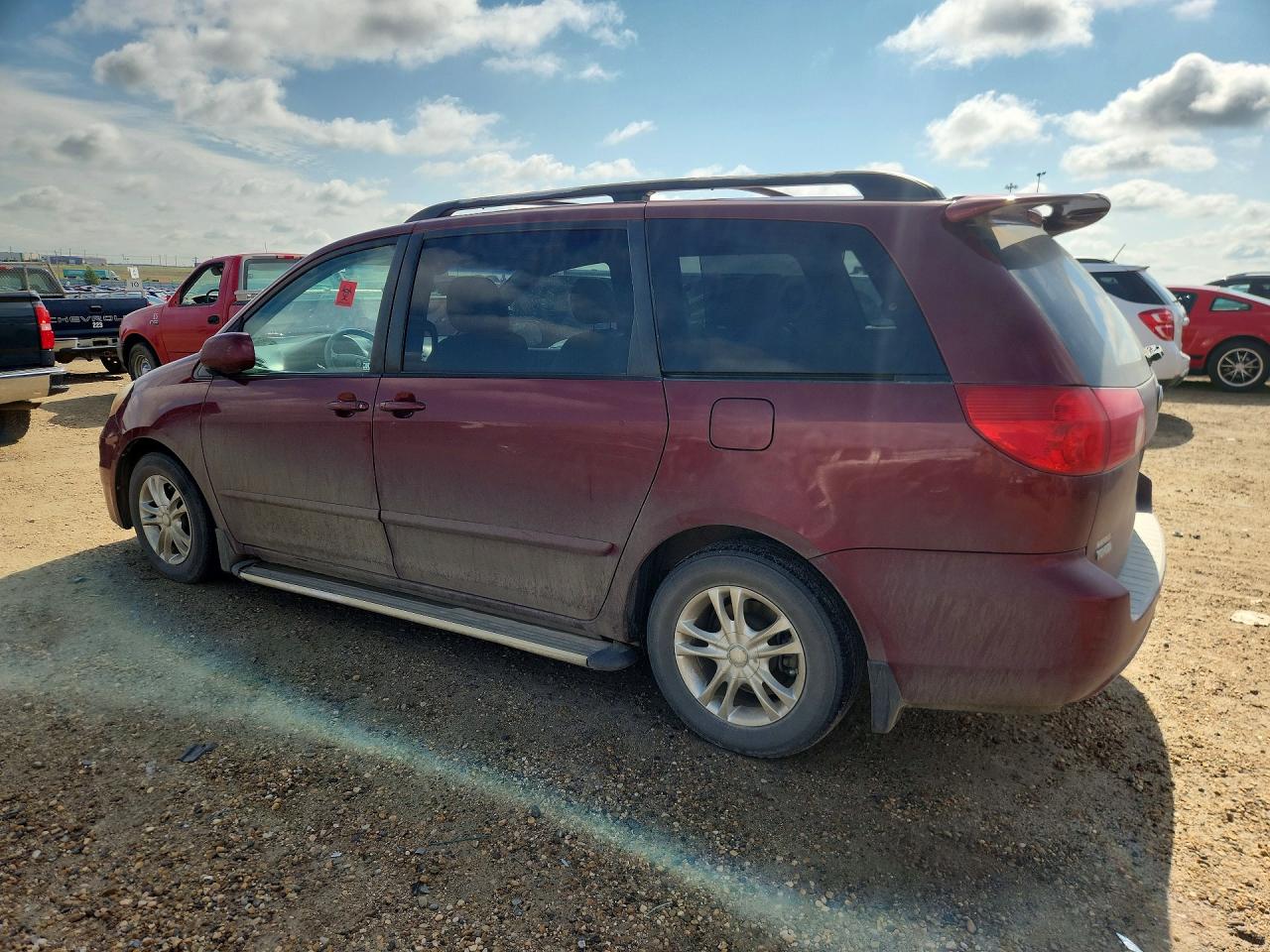 2009 Toyota Sienna Ce 7-passenger Maroon vin: 5TDZK23C79S241356
